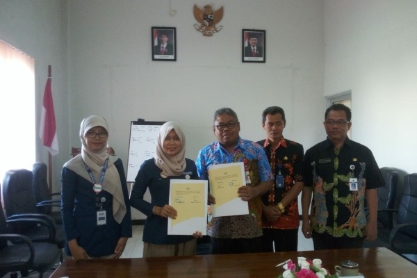 Penandatangan kerjasama antara BPJS Cabang Pati dengan DPMPTSP Blora